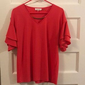 Blouse with gold metal detail and layered sleeves